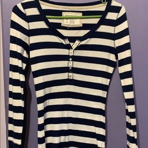 A button up v-neck sweater